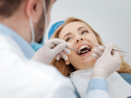 a dental patient undergoing a routine checkup