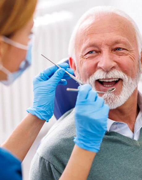senior man undergoing dental checkup