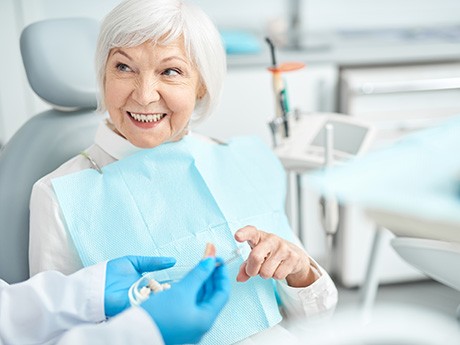 a patient and dentist talking