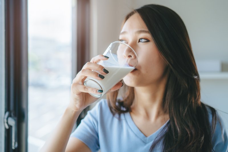 Patient drinking milk to help with their dental implant
